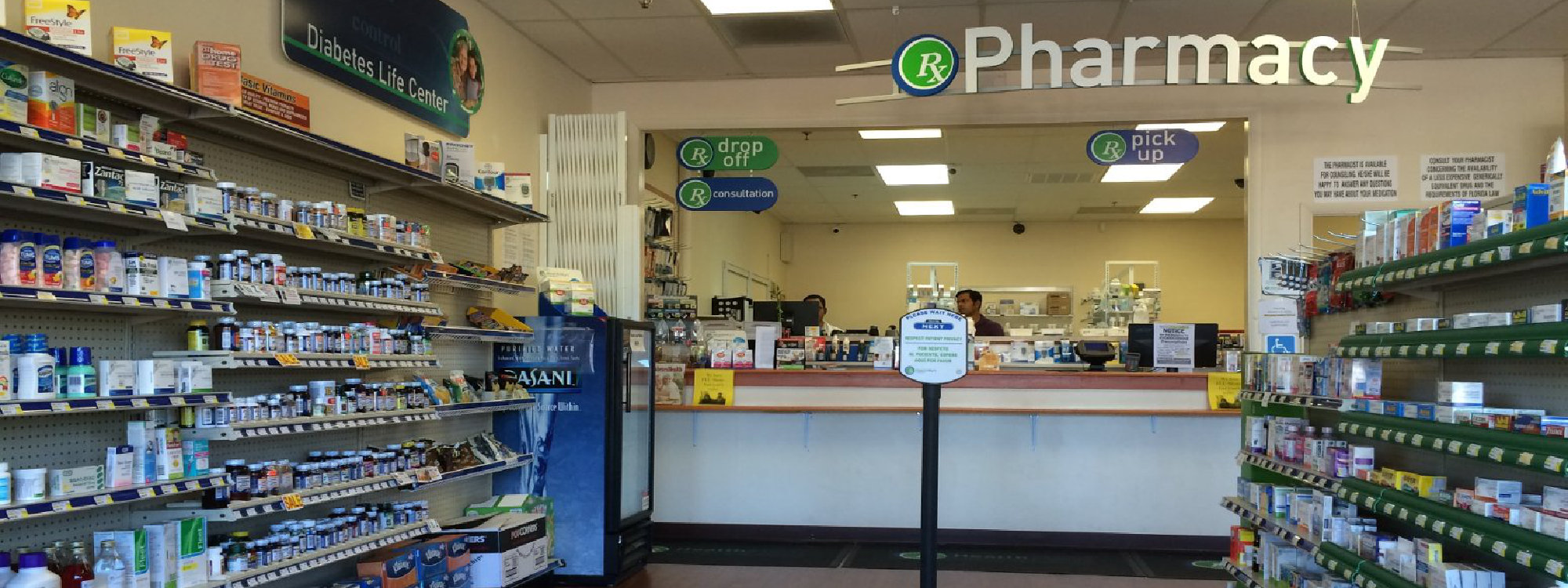 Ricker Pharmacy prescription drop-off and pick-up counter